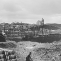 Black and white photograph of Macduff Harbour with Parish Church in the background