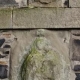 Carving of the Virgin Mary 1628 on Plainstones Banff
