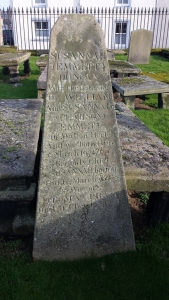 Colour photo of triangular-ish gravestone