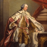 Colour photo of James Duff dressed in his road cloak and fur.