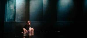 Image of a man in a pool of water