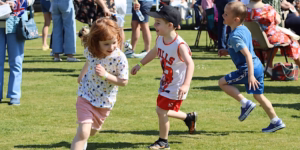 Image of children playing at a family fun day event